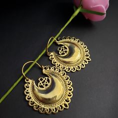 Mandala , crescent shaped earrings  Available in silver and gold polishing.. very light weight Nickle free Crescent Jewelry With Intricate Design, Gold Crescent Hoop Earrings In Brass, Gold Semi-circle Earrings For Gift, Elegant Crescent Brass Hoop Earrings, Gold Semi-circle Metal Earrings, Elegant Crescent Shaped Brass Hoop Earrings, Gold Crescent Brass Earrings, Elegant Half Moon Pierced Earrings, Elegant Semi-circle Brass Earrings