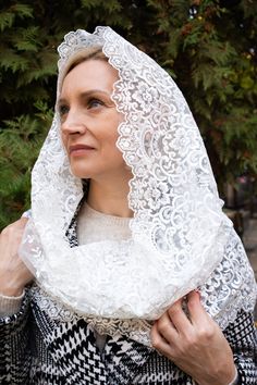 CHRISTMAS SALE☃️❄️ -25% + get free veil ♥️ Welcome to MariaVeils Here you will find best lace veils created with love and big faith️🌸 More about this veil: Style: Short Veils  Thread color: ivory Tulle color: ivory All our veils are located in Blaine, MN and are ready to ship!  Delivery will take only 2-3 days 💫 If you have any question, go ahead and text us! We will be happy to help you❤️ Answers to the most popular questions - Is there any clasp or clips on the veil?  -  Of course! All our veils ave sewn in hair combs,  which guarantee a valid fixation of the veil on the head. But if anything, you can easily remove it yourself. - How soon will I receive my veil? - Delivery in USA takes near 2-3 days! - Can I return the veil? - Unfortunately, no, but you can exchange the veil for any ot Elegant White Lace Veil, White Shawl For Traditional Ceremonies, White Lace Trim Veil For Ceremony, White Lace Wedding Shawl, Lace Ceremony Veil, White Lace Shawl With Lace Trim, White Lace Trim Shawl For Wedding, Traditional White Veil, White Lace Shawl For Wedding