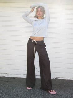 Relaxed wide leg pant in a deadstock chocolate linen. Drawstring waist in the front, and flat back with back darts creates a flattering fit Roomy front pockets Can be worn low to high waisted Made in Los Angeles with deadstock fabric in a fair-wage facility Materials: Chocolate brown upcycled deadstock linen fabric Sizing: True to size S/M waist 17.5" laid flat, inseam 31.25" M/L waist 19" laid flat, inseam 32.5" Care Instructions: Machine wash cold, hang to dry Model is 5'4" and wears size S/M. Deadstock Fabric, Wide Leg Pant, Chocolate Brown, Linen Fabric, Drawstring Waist, Wide Leg Pants, Care Instructions, Wide Leg, High Waisted