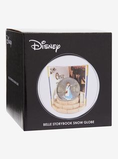 the disney storybook snow globe is in its box