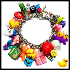 "Fun & Adorable Small Toys Charms Bracelet! SO CUTE! I make these Charm Bracelets with mini toys and charms on silver chain.  Guaranteed to make you smile! Lobster Clasp and Adjustment chain. ~7 3/4\" fit most" Junk Bracelets, Fun Charm Bracelet Jewelry, Cute Charm Bracelets, Beads Charms, Junk Charm Bracelet, Charms Bracelet, Charm Bracelet Ideas, Gold Novelty Bracelets With Charms, Friendship Novelty Charm Bracelet