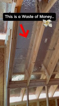 the inside of a house that is being built with wood framing and insulation on the ceiling