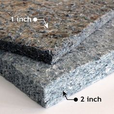 two different types of carpet on top of each other, one is gray and the other is black