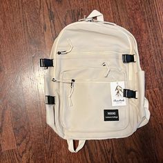 Nwt Olivia Mark Backpack Casual Cream Satchel Backpack, Trendy Cream Rectangular Backpack, Casual Cream Backpack With Adjustable Strap, Trendy Cream Standard Backpack, Trendy Cream Backpack, Cream Backpack With Adjustable Strap For Students, Student Cream Backpack With Adjustable Strap, Student Backpack With Adjustable Strap In Cream, Casual Cream Backpack For Everyday Use