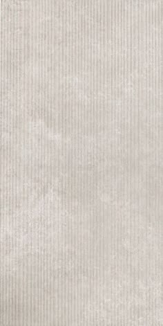 an image of a white textured wallpaper with vertical lines on the bottom and sides