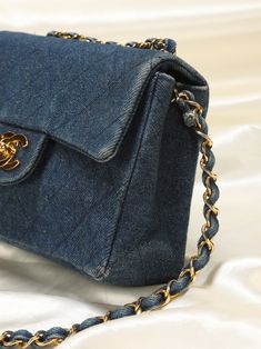 CONDITION: GOOD VINTAGE .?ÿ Extremely rare Chanel mini flap crafted with denim quilting and 24 karat gold hardware - a Chanel collectors dream! Can be  as a crossbody, short shoulder bag, or long shoulder bag.?ÿOnly one other one in this exact style online going for $10k. Please note:?ÿSome fading near corners on exterior denim. Minor discoloration on chain.?ÿ In order to meet the current demand and given the?ÿnature of sourcing inventory, all sales are final. Please be sure to review all pictures and ask any questions prior to making a purchase! To prevent any form of fraud, I?ÿkeep video records of?ÿmyself?ÿpackaging?ÿand dropping off each order, and?ÿall?ÿorders ship with?ÿtracking and?ÿsignature?ÿconfirmation. Please ensure your shipping address is correct as we are not responsible?ÿfo Denim Chanel Bag, Long Shoulder Bag, Coco Handle, Mini Classic, Girl Backpacks School, Denim Quilt, Chanel Mini, Ladies Diamond Rings, Backpack Tote Bag