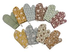 six oven mitts in various colors and patterns