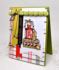 a close up of a card on a table with white doily and green trim