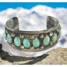 Add A Boho Touch To Your Style With This Vintage Sterling Silver Cuff, Featuring Turquoise Stones. Perfect For Free Spirits And Old Souls Alike. Sterling Silver Construction Turquoise Stones Weight: 80g Width: 1" Handmade Design Southwest Style Minor Tarnishing And Wear Visible On The Inner Side. Size: Unisex 1" Wide Condition: Pre-Owned Good Old Souls, Turquoise Bracelet Cuff, Royston Turquoise, Turquoise Cuff, Southwest Style, Sterling Jewelry, Turquoise Stones, Sterling Silver Cuff, Silver Cuff