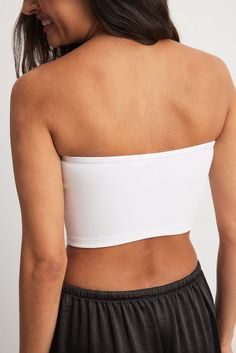 Cropped Tube Top White | NA-KD Stretch Cropped Tube Top Bra Friendly, Stretch Cropped Tube Top, Bra Friendly, Bra Friendly Cropped Stretch Tube Top, Trendy Strapless Crop Top With Built-in Bra, White Bandeau Tank Top, Trendy White Strapless Tank Top, Trendy Crop Tube Top With Built-in Bra, Stretch Cropped Tube Top With Built-in Bra, White Seamless Bandeau Tank Top