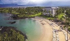 an aerial view of the resort and beach