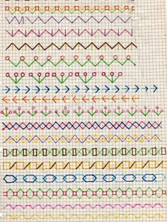 a cross stitch pattern with different colors and designs on the bottom, including an arrow