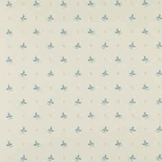 a white wallpaper with small blue flowers and leaves on the bottom half of it