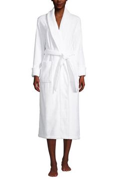 Whether you're just getting started or settling in for the night, our spa robe delivers VIP treatment. Soft and substantial, it feels luxurious against your skin. It's super absorbent, helping you dry off quickly. And its long length makes it perfect for lounging. Is that the couch calling? Plush cotton terry cloth for maximum cuddle factor; Cozy shawl collar keeps chills off your neck Easy to tie belt with a loop on each side to keep it in place Turn-back cuffs Reinforced patch pockets Midcalf Terry Cloth Bathrobe, Terry Robe, Spa Bath, Bath Spa, Sleepwear Robe, Sleepwear Women, Terry Cloth, Lands End, Plus Size Outfits