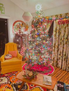 a brightly colored christmas tree in a living room