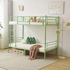 a green bunk bed sitting in a bedroom next to a plant and potted plant