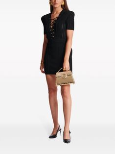 This Balmain mini dress features a V-neck, lace-up detailing, short sleeves, and a straight hem. It has gold-tone hardware, eyelet detailing, and lace detailing. It fastens with a rear zip and has a thigh-length silhouette. Black Minidress, Balmain Collection, Classic Wardrobe Staples, Water Consumption, Mens Fall, Neck Lace, Harmful Chemicals, Sweaters Knitwear, Emilio Pucci