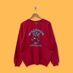 Vintage 90s Wisconsin Badgers sweatshirt Wisconsin Badgers crewneck Wisconsin Badgers sweater streetwear pullover nice Red colour size large by YoungmodernCo on Etsy Sweater Streetwear, Wisconsin Badgers, Wisconsin, Red Color