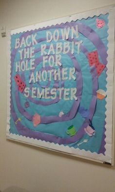 a bulletin board hanging on the wall in a room