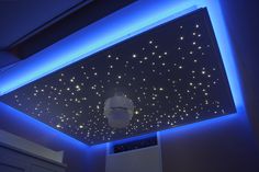 the ceiling is decorated with stars and lights