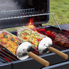 two bbq grills with different types of food cooking on them