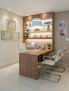 an office with two chairs and a desk