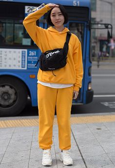 Sporty Contrast Color Sweatshirt For Streetwear, Streetwear Athleisure Sweatshirt With Contrast Color, Yellow Athleisure Hoodie For Streetwear, Sporty Sweat-resistant Hoodie For Streetwear, Yellow Editorial, Waist Bag Outfit, Yellow Tracksuit, Yellow Urban Sweatshirt For Streetwear, Adidas Leggings Outfit