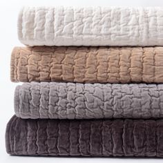 four towels stacked on top of each other