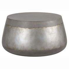 a round metal table with silver paint on the top and bottom, sitting in front of a white background