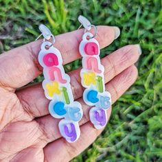 Rainbow Pastel Anxiety earrings. Each earring features the word "anxiety" displayed vertically. Each of the seven letters is a different color displayed on top of a white background. Order with the Default Stud to get the earring as pictured. If you would prefer an ear wire or hook, choose the Ear Hook option.Each earring measures 3 inches (7.6 cm). Metal is quality hypoallergenic stainless steel for sensitive ears. Materials: Acrylic Hypoallergenic Stainless Steel Note: The backs of these earri Jewelry Text, Lesbian Earrings, Stainless Steel Mirror, Weird Jewelry, Steel Mirror, Rainbow Pastel, Funky Earrings, Mirror Acrylic, Magical Jewelry