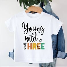 Custom Screen Printed Young Wild And Three T Shirt Size Small Length = 20in Width = 14.5in Brand New Never Worn Playful White Slogan T-shirt, Playful White T-shirt With Slogan, Third Birthday Shirt, Young Wild And Three, Custom Screen Printing, Three Kids, Birthday Shirts, Birthday Ideas, Kids Shirts