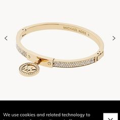 Sku: Mkj5976710 Closure: Hinge Primary Color: Gold Material: Steel Measurements: Inner Length: 49.5mm, Inner Width: 59.5mm, Bangle Width: 5mm Silhouette: Bracelet Michael Kors Gold-Tone Plated Stainless Steel Pav Hinged Bangle Bracelet Item #: Mkj5976710 Bracelet Michael Kors, Tortoise Shell Bracelet, Pave Bangle, Michael Kors Bracelet, Pave Bracelet, Double Wrap Bracelet, Michael Kors Jewelry, Buckle Bracelet, Toggle Bracelet