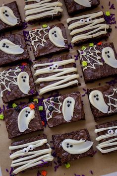 halloween brownies decorated with white icing and sprinkles