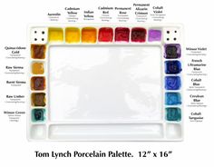 a white tray with lots of different colored paints in it's bottom and bottom