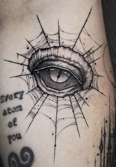 a tattoo with an eye and some words on the side of his arm that says, every