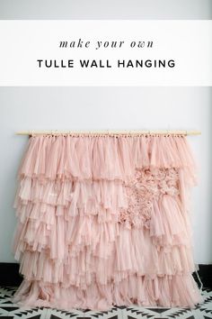 a pink tulle wall hanging with the words make your own tulle wall hanging