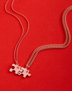 There's nothing quite like the undeniable connection you share with that special someone. Whether they're your soulmate or BFF, it's truly something worth celebrating. Introducing our Puzzle Necklace for Couples, featuring interlocking puzzle pieces. One pendant is for you, and the other is for your loved one. Personalize each piece with an engraved initial and choose between a black or white zirconia for added elegance. With these couples' necklaces, you can carry a piece of your soulmate with you wherever life takes you. DETAILS Available in 18K Gold Vermeil, 18K Rose Gold Vermeil or 925 Sterling Silver Chain type : Cable & Curb Chain Add a single initial per puzzle Choose between a white zirconia to a black zirconia *Customizable items are made to order & are final sale. Necklace For Couples, Couples Necklaces, Puzzle Necklace, Couple Pendant, 925 Sterling Silver Chain, Curb Chain, Puzzle Pieces, 18k Rose Gold, Sterling Silver Chains