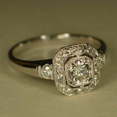 a diamond ring is shown on a table