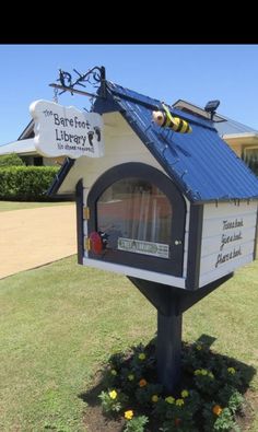 a mailbox shaped like a bee house