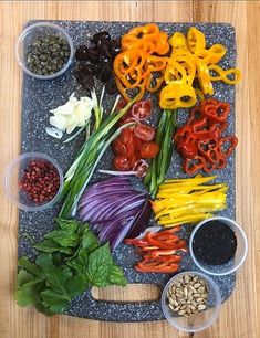 the vegetables are laid out on the cutting board