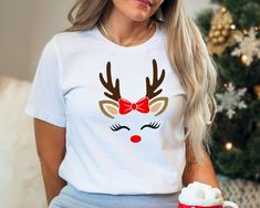 Christmas Shirt, Reindeer Christmas Shirt, Reindeer Face Shirt, Reindeer Shirt for Woman, Christmas Shirt for Mama  ORDER INSTRUCTIONS  ➤ Check and review all listing photos. ➤ Pick up your item's size and color from drop down menus. ➤ Choose the quantity. ➤ Click "Add to Cart" button. ➤ Fill in the personalization box as recommended if provided.  ➤ You can go back to add more item or you can complete the checkout process. ➤ Click "Proceed to Check Out".  WHICH SIZE FITS ME BEST  ➤ In each listi Reindeer Shirt, Reindeer Face, Heat Press Printing, Christmas Apparel, Kids Jackets, Deer Christmas, Deer Design, Christmas Tshirt, Reindeer Christmas