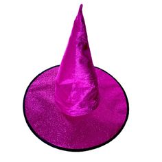 a purple witches hat sitting on top of a black round tablecloth covered in glitter