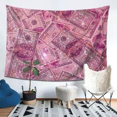 a pink wall hanging over a white rug