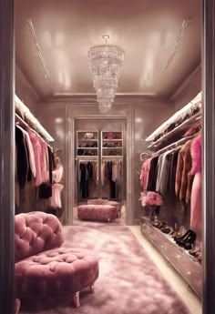 a walk in closet with pink furniture and chandelier hanging from it's ceiling