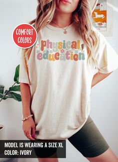 the model is wearing a size xxl t - shirt with colorful words on it