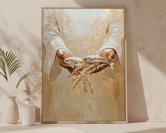 a painting of two hands holding wheat stalks