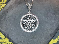 Step into the realm of mysticism and magic with this Ornate Pentacle Celtic Knot Crescent Moon Pendant Necklace. Crafted with exquisite detail, this hand-poured zinc-alloy pendant is a symbol of profound significance, resonating with gothic, pagan, satanic, and wiccan aesthetics. The intricate design features a pentacle intertwined with a Celtic knot, crowned by a crescent moon, evoking ancient symbolism and sacred geometry. Cast in sleek silver, this pendant exudes an aura of dark elegance, making it a captivating addition to any ensemble. Whether you're drawn to its mystical allure or seek to honor ancient traditions, this necklace is a statement piece that commands attention. Wear it as a talisman of empowerment or share its magic with a loved one as a unique gift. Illuminate your style Pentacle Necklace, Nickel-free Gothic Pendant Jewelry, Pentacle Jewelry, Silver Moon-shaped Amulet Necklace, Nickel-free Moon Shaped Spiritual Necklace, Pentagram Pendant, Wiccan Jewelry, Crescent Moon Pendant, Moon Pendant Necklace