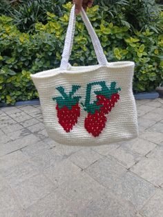 🍓 Strawberry Tote Bag Crochet Pattern 🍓 Add a touch of sweetness to your style with our delightful Strawberry Tote Bag Crochet Pattern! Perfect for crochet lovers, this pattern guides you in creating a charming tote bag adorned with adorable strawberries, making it a fun and functional accessory. Features: 🍓 Strawberry Design: Create a stylish tote bag with cute strawberry motifs that are perfect for any season.👜 Functional and Fashionable: This tote bag is not only charming but also practic Cute Everyday Crochet Tote Bag, Cute Handmade Crochet Tote Bag, Casual White Hand-knitted Bag, Casual White Hand Knitted Bag, Cute White Crochet Tote Bag, Cute Crochet Tote Bag, Tote Bag Crochet Pattern, Strawberry Tote Bag, Tote Bag Crochet