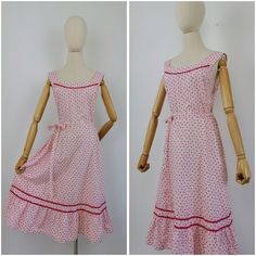 "Vintage 70s ditsy prairie sundress. Has ruffle skirt with a pocket, original belt and fastens with zip at the back. Made from thick crisp cotton. Light pink with fuchsia floral print. Fabric: assuming cotton Brand: unknown Perfect vintage condition apart from some very light discolouration along the waistline Fits size UK 16 / L or smaller depending on desired fit. Mannequin is size UK 6. Dress is pinned on the mannequin on some photos. Measurements (taken laid flat and doubled when applicable) Puff Sleeves Dress, White Cotton Blouse, Prom Midi Dress, Midi Sundress, Floral Print Fabric, Floral Sundress, Midi Dress Party, Beautiful Skirts, 1950s Fashion