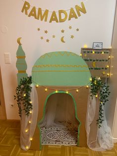 a room decorated with lights and decorations in the shape of a tent for a baby's bed